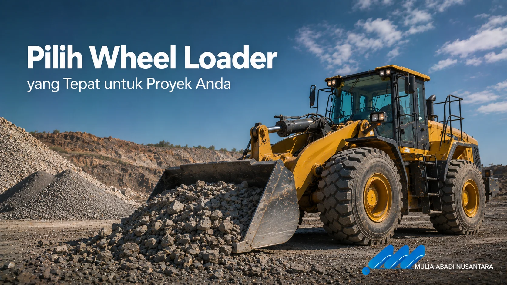 Banner Pilih Wheel Loader yang Tepat untuk Proyek Anda dengan wheel loader membawa material batu di area pertambangan.
